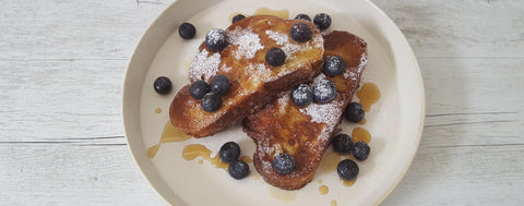 French toast with fresh fruit and maple syrup